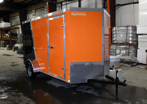 front of orange and black trailer