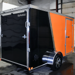 Rear view of black and orange single axle professional series trailer