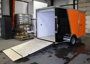 open rear of orange and black single axle trailer