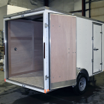 rear of white light duty trailer