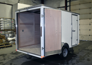 rear of white light duty trailer