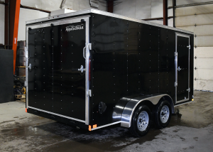 closed rear of black tandem axle trailer