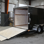 open rear of black tandem axle trailer