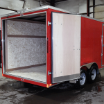 open rear of red tandem axle standard duty trailer