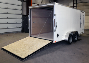 open back end of white tandem axle trailer