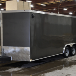 front of grey tandem axle trailer