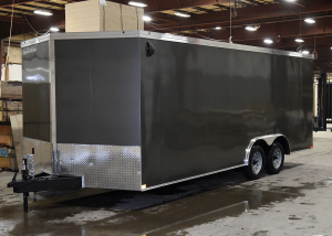 front of grey tandem axle trailer