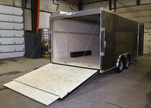 rear of grey tandem axle trailer