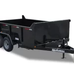A small, black dump trailer is pictured for the article titled "CDL Requirements: State and Federal Regulations."